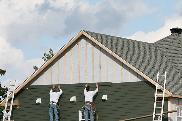 Professional Siding Repair technician working in Upper Falls, MD